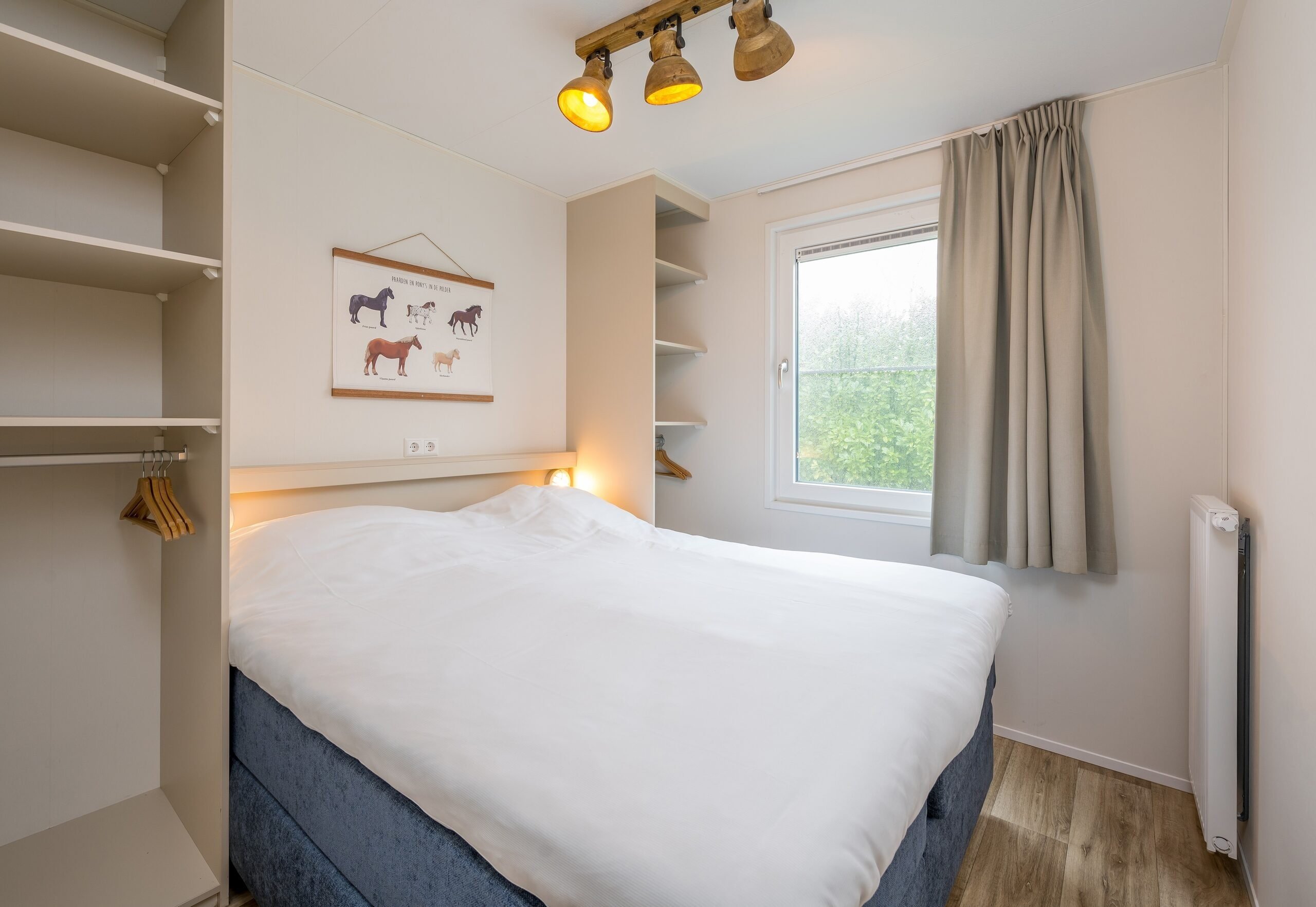Stip de pony huisje slaapkamer bij Familie Resort Molenwaard